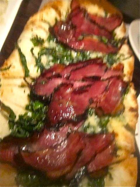 It takes chutzpah to mix pastrami, heavy cream and kale on a flatbread. Forgive my blur.