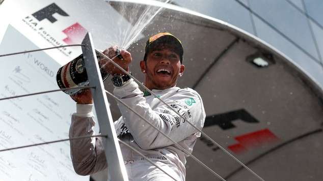Lewis Hamilton celebrates win over Nico Rosberg Circuit of the America's Austin Texas F1 November 2, 2014  OMPRACING.boards.net motorsport news